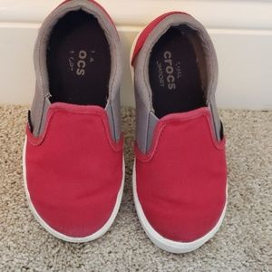 Crocs slip on sneakers.   Size 10